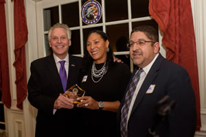 Linda Singh Accepts Award