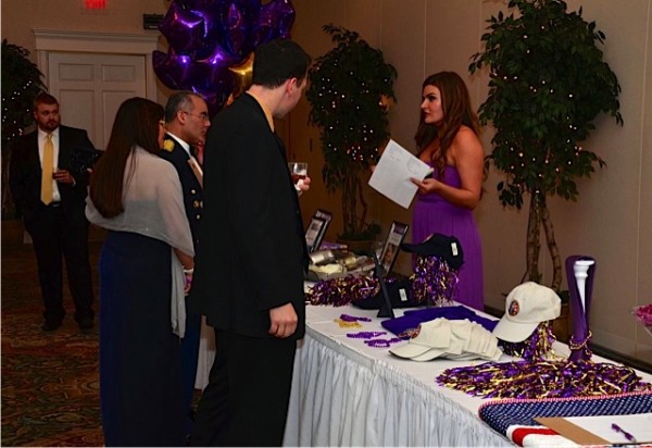 Rachael Satterfield running the silent auction